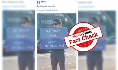 Woman holding 'Go Back Modi' placard is morphed