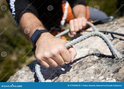 A Man Climbing a Ferrata Route in Calcena, Spanish Mountains Stock ...