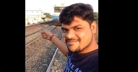 Student tries to take a selfie video in front of an approaching train ...