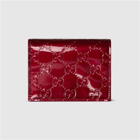 GG Emblem small wallet in Rosso Ancora red GG leather | GUCCI® US