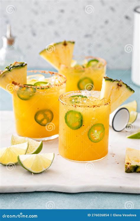 Pineapple Jalapeno Margarita Cocktail in Glasses with Tajin Rim Stock ...