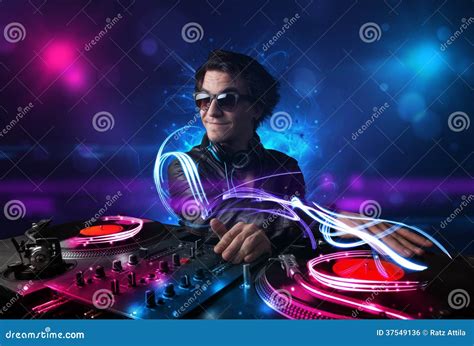 Disc Jockey Playing Music with Electro Light Effects and Lights Stock ...