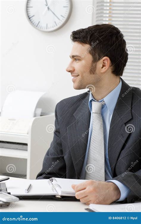 Businessman Working at Desk 的图像结果