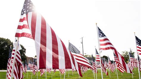 Survivor of 9/11 Pentagon attack honors the day at flag display