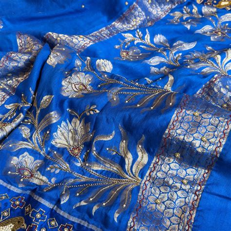 Moonga silk inspired ikkat patola inspired hand embroidered kadhwa sar ...