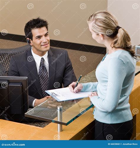 Receptionist Greeting Woman At Front Desk Royalty-Free Stock Image | CartoonDealer.com #6603868