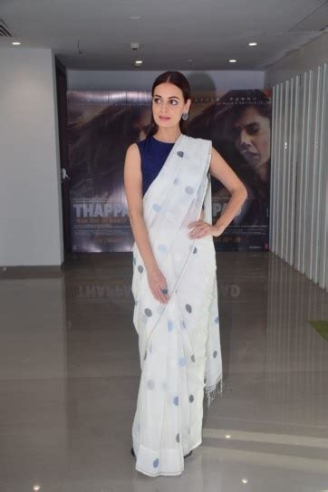 Dia Mirza makes an elegant appearance in sleeveless blouse and white ...