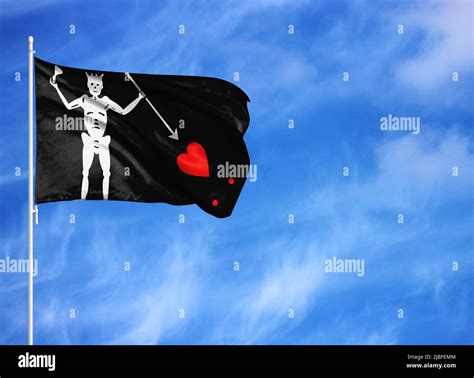 National flag of Blackbeard Pirate on a flagpole Stock Photo - Alamy