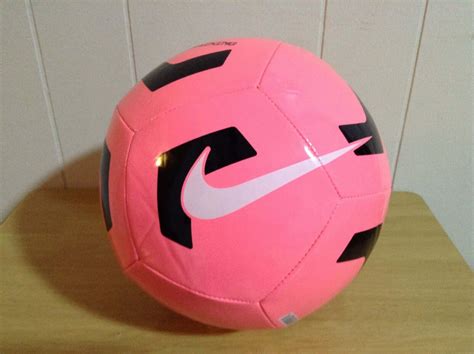 Download Bright Pink Soccer Ball on Vibrant Green Grass Wallpaper ...