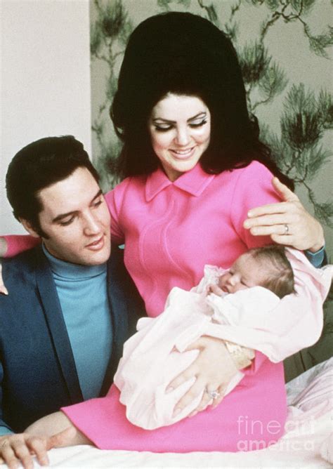 Elvis Presley With Wife And Newborn Photograph by Bettmann