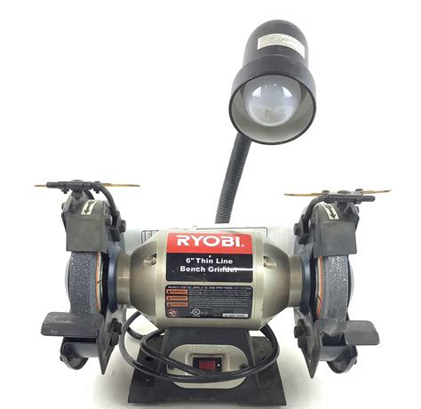 Lot - Ryobi Bench Grinder With Lamp & Manual