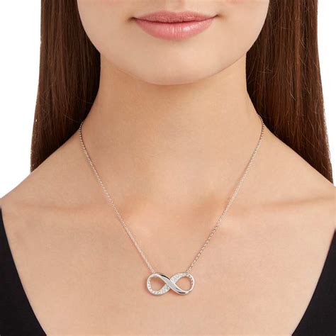 Exist pendant, Infinity, White, Rhodium plated | Swarovski