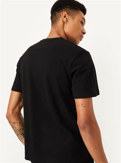 Buy Men Solid Knitted Lounge T-shirt Online at just Rs. 499.0 ...