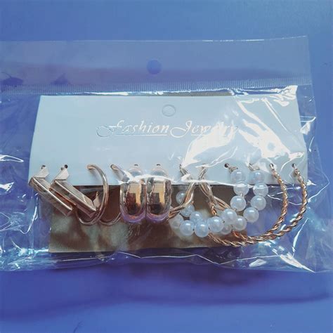 Gold and white colour earrings. 6 pairs. - Depop