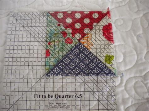 How to Use a Quarter Square Triangle Ruler for Quilting 的图像结果