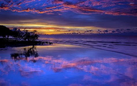 Amazing purple sunset clouds reflected in the wet beach wallpaper ...