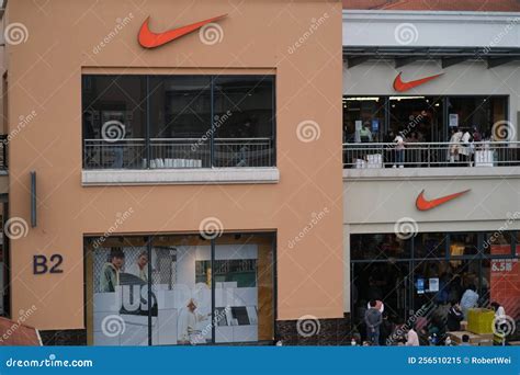 Large NIKE Outlet Store with Brand Logo Editorial Image - Image of ...