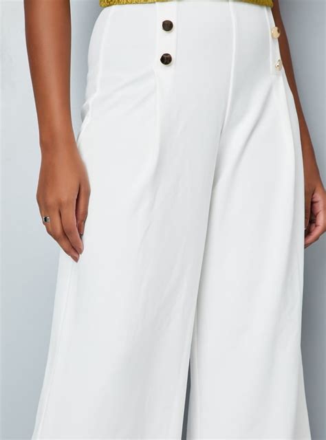 Buy Women Solid Wide Leg Trousers Online at just Rs. 1199.0 ...