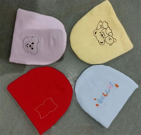 Winter Cap - Girls Pom Pom Caps Manufacturer from New Delhi