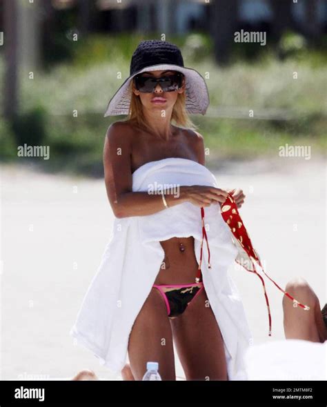 Playboy Playmate Shauna Sand spends the day on Miami Beach with her new ...