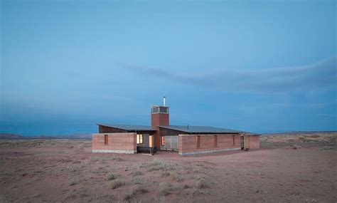 11 mud houses and rammed earth buildings that honour their surroundings ...