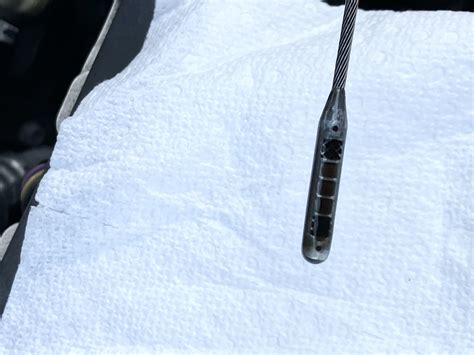Burning Oil? Dipstick issue? : r/car