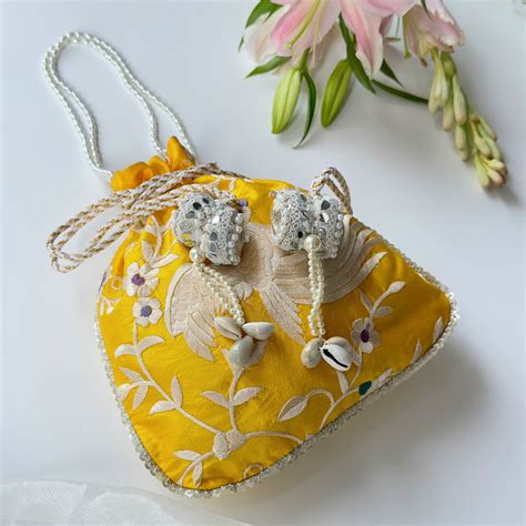 Quirky Tales - Designer Handbags and Clutch bags