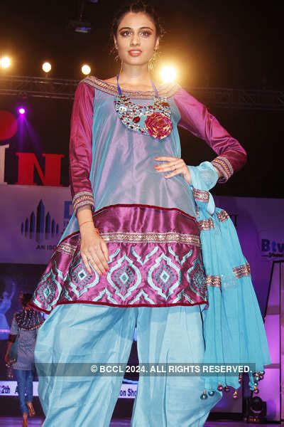 A model presents the creation of student designers from INIFD during a ...