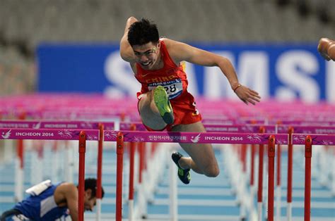 组图：亚运男子110米栏决赛 谢文骏夺冠韩国亚军--体育--人民网