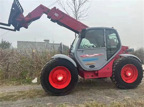 Image result for Manitou Cabless Telehandler Loader