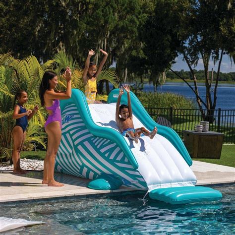 The Wiggle Sprinkler Slide | Inflatable water slide, Water slides, Pool ...