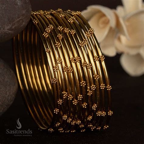 Oxidised Antique Gold Embossed Bangles with Floral Dot - Sasitrends