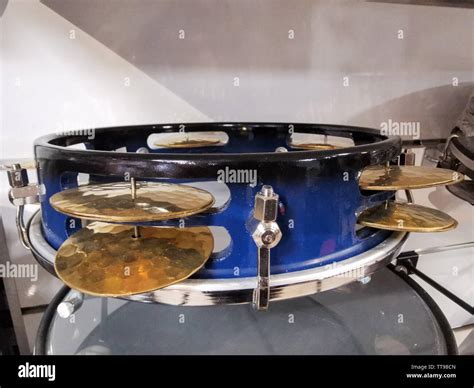 Play the tambourines hi-res stock photography and images - Alamy