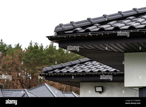 Installing Gutter Lights 的图像结果