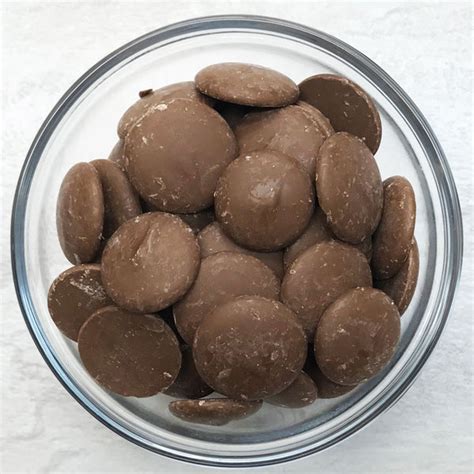 https://confectioneryhouse.com/cdn/shop/products/milk-chocolate-merckens-candy-coatings_2_ce38f12c-b529-45a8-b304-b39f8e573b87.jpg?v=1684365427&width=600&utm_source=chatgpt.com