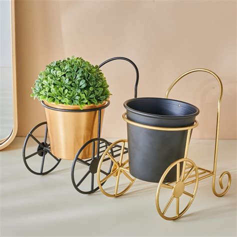 Buy Gloria Metal Trolley Planter from Home Centre at just INR 599.0