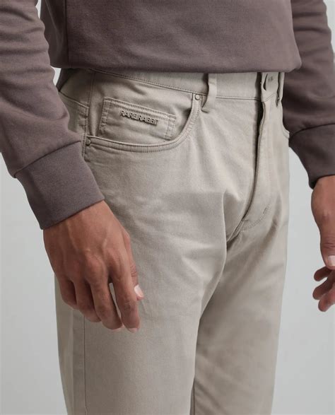Rare Rabbit Men Spoke-Aw25 Beige Cotton Blend Fabric Button And Zip Cl