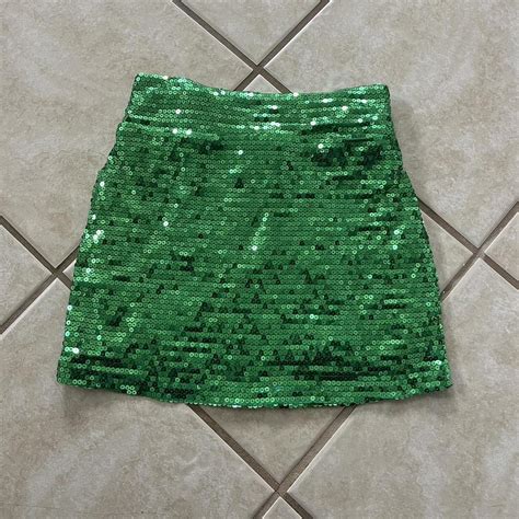 green sparkly sequin mini skirt! perfect for going... - Depop