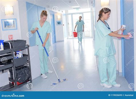 Cleaner with Mop and Uniform Cleaning Hospitals Corridor Stock Image - Image of broom, bucket ...