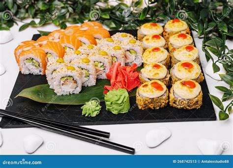 Different Sushi Rolls on a Big Plate Stock Image - Image of rice, warm ...
