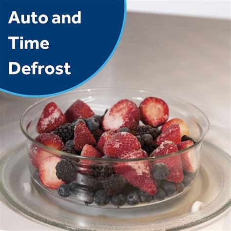 GE 0.7-cu ft Small 700-Watt Countertop Microwave (White) GCHK07N1WWW at ...