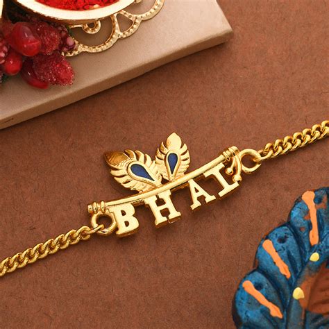 trueBrowns Peacock Feather Motif Gold Tone Bhai Rakhi