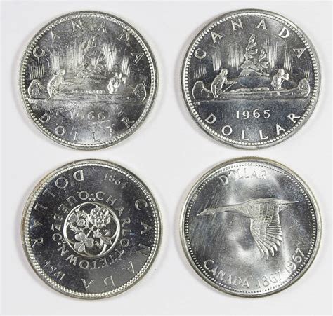 (4) Canada Silver Dollars Auction