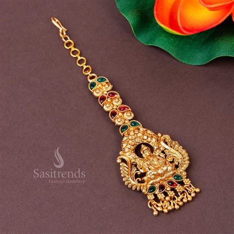 Exquisite Matte Gold Plated Lakshmi Maang Tikka with Premium Stones ...