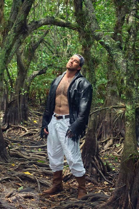 Travis Kelce Wears Fur and an Alligator in Steamy Florida Swamp Photo Shoot