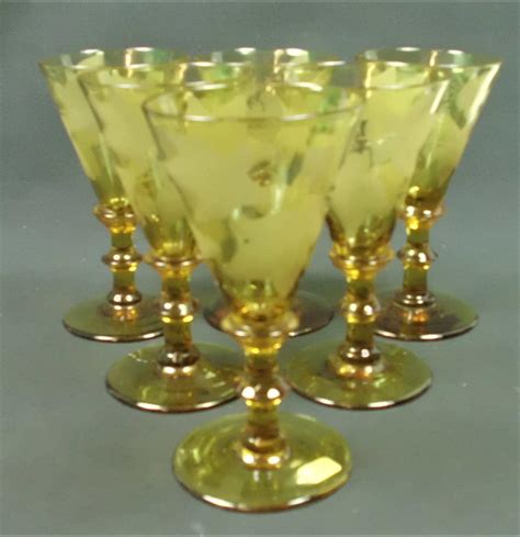 Set of six amber wine glasses engraved with ivy, circa 1830 | BADA