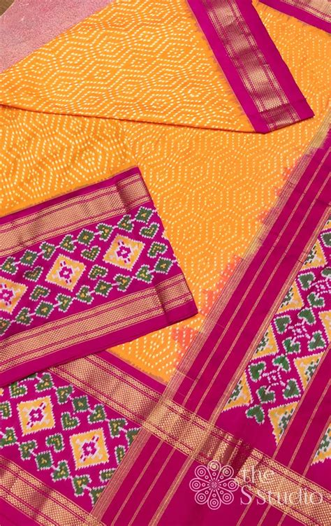 Buy orange ikkat silk saree with rani pink border