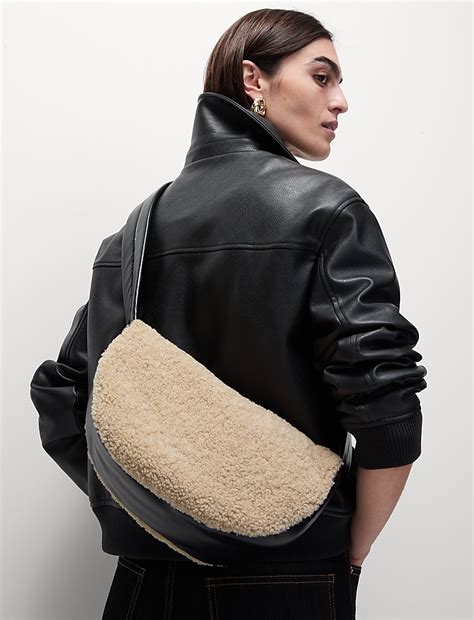Buy Faux Shearling Cross Body Bag at Marks & Spencer
