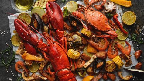 Download Lobster With Crabs And Corn Wallpaper | Wallpapers.com