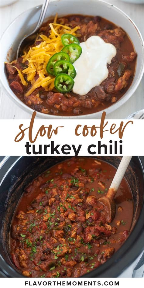 A bowl of Laura's quick slow cooker turkey chili, topped with shredded cheese, sliced green onions,